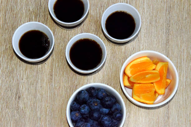 istock Four cups of coffee and fresh fruit 1127839807