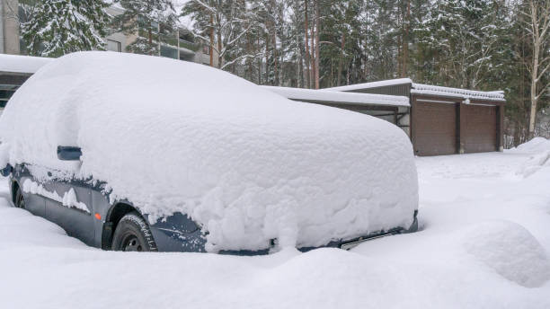 istock Parked car in snow. February 2019. 1127841505