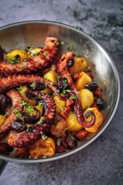 istock Octopus Tentacles with Potatoes and Fresh Lemon 1127841828