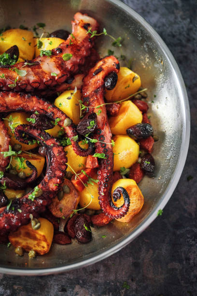 istock Octopus Tentacles with Potatoes and Fresh Lemon 1127841832