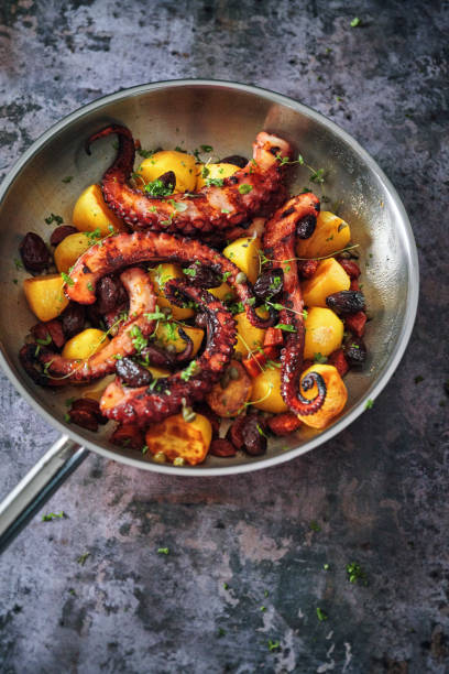 istock Octopus Tentacles with Potatoes and Fresh Lemon 1127841835