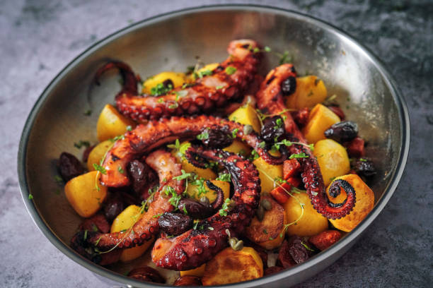 istock Octopus Tentacles with Potatoes and Fresh Lemon 1127841836