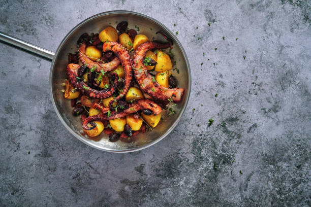 istock Octopus Tentacles with Potatoes and Fresh Lemon 1127841838