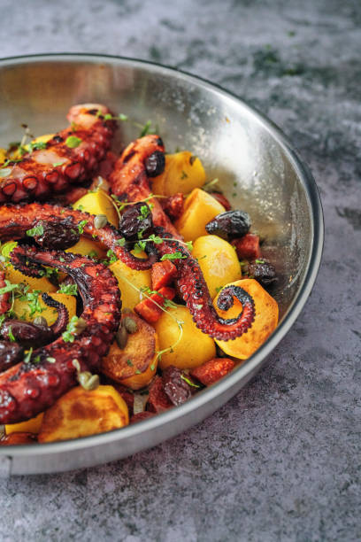 istock Octopus Tentacles with Potatoes and Fresh Lemon 1127841843
