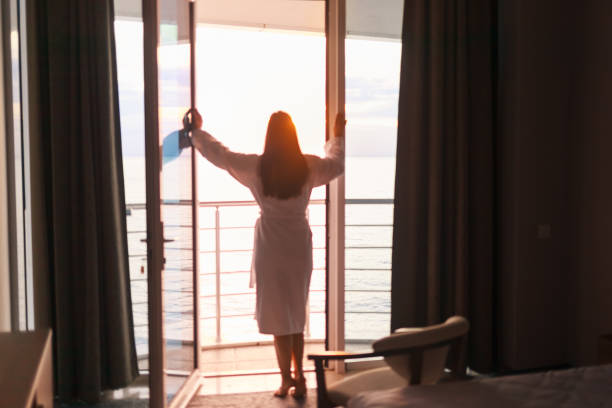 istock Young woman enjoying the sea side. 1127843188