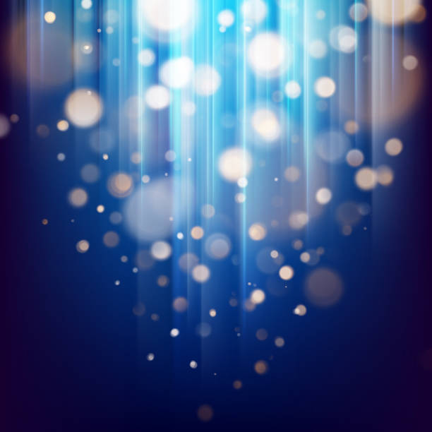 istock Abstract bokeh background of golden light with blue background. EPS 10 1127844414