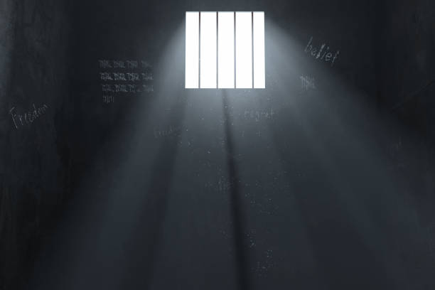 istock 3d rendering of grunge prison cell with  light ray of window 1127844684