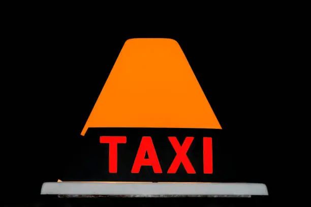 Orange and red Taxicab sign