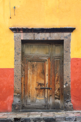 Small blue wooden window at home made of wood and clay in the region of Cunha, state of Sao Paulo, Brazil