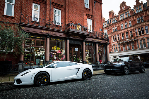 London, UK - 5 February, 2019: color image depicting a white Lamborghini Murcielago sports car parked on the city street in Mayfair, one of the most exclusive and luxurious parts of London. Room for copy space.