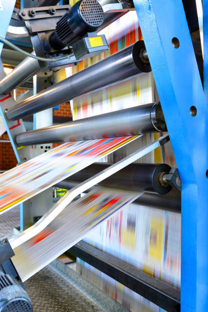 istock printing of coloured newspapers with an offset printing machine at a printing press 1127847749