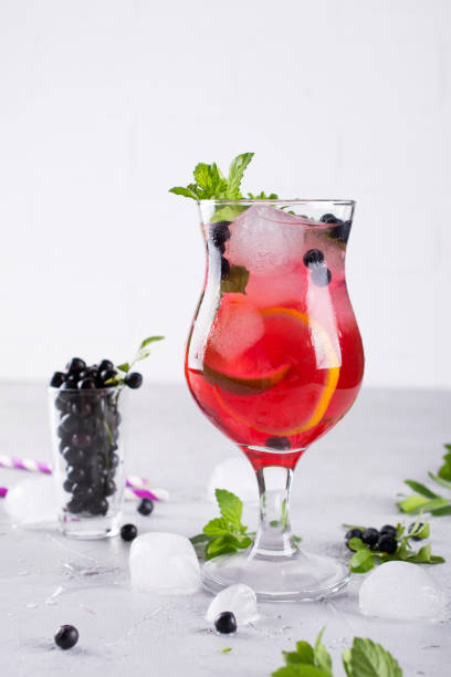 istock Summer cold drink with blueberry, mint lemon and ice in glass 1127852878