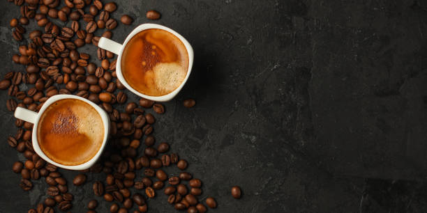 coffee freshly brewed in a white cup serving of beverage (coffee grain). food. top.copy save