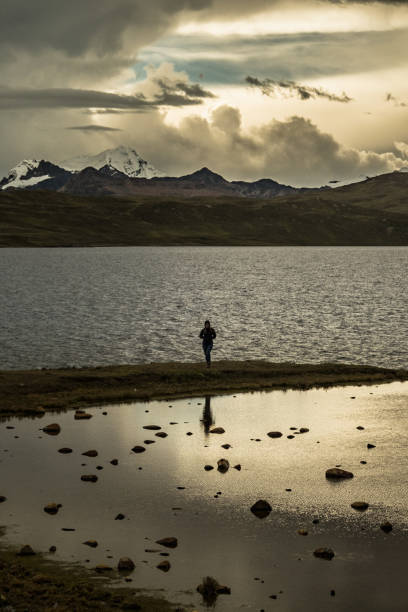 istock Traveller hiking in between lakes high up in the mountains 1127854334