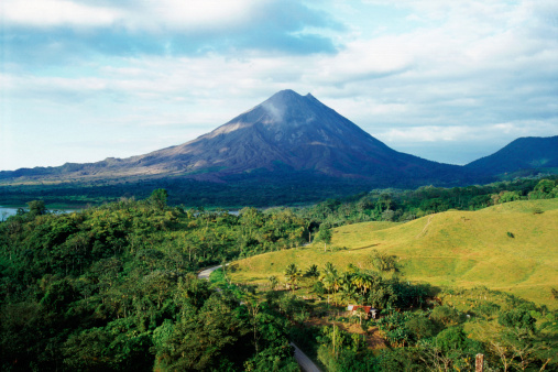Farm land and rain forest surrounding the Arenal Volcano in Costa Rica, Central America.