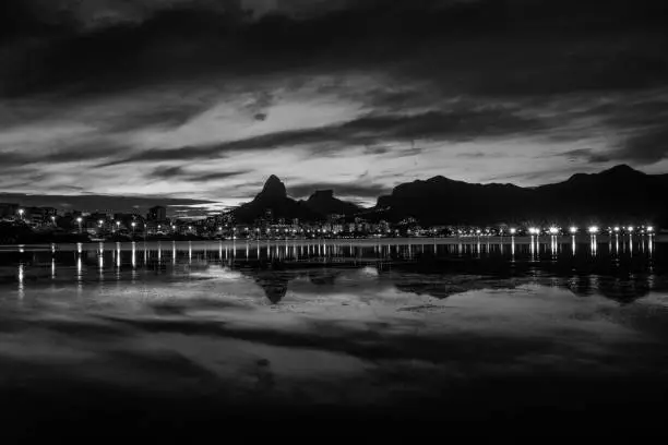 Sunset on the Rodrigo de Freitas Lagoon in the southern zone of Rio de Janeiro, Brazil attracts tourists from all over the world and locals to watch this spectacle of nature