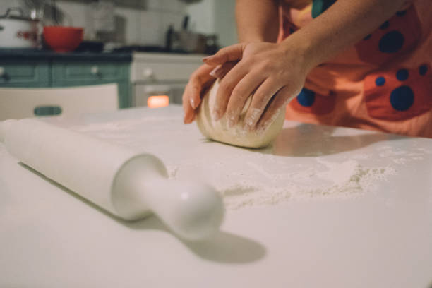 istock Italian Girl Preparing Doe for Tortelli 1127859442