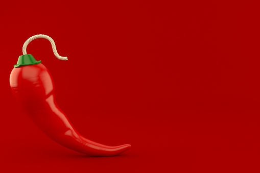 Hot pepper with bomb wick isolated on red background. 3d illustration