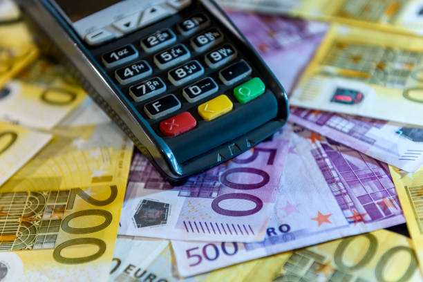 istock Terminal at euro banknotes background close up 1127861654
