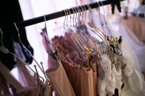 istock many hangers in the store or wardrobe 1127862508