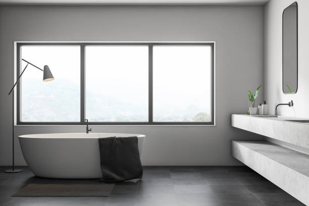 istock White bathroom interior, tub and double sink 1127865583