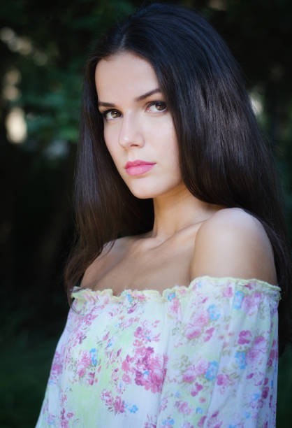 istock Woman in the summer nature 1127865917