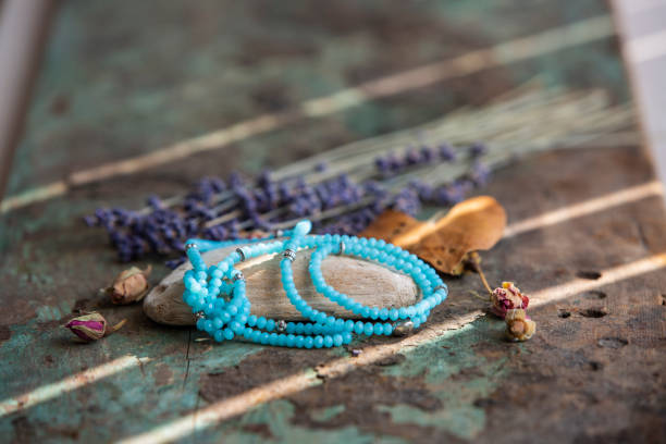 istock Bracelets made with natural stone beads and various signs 1127869689