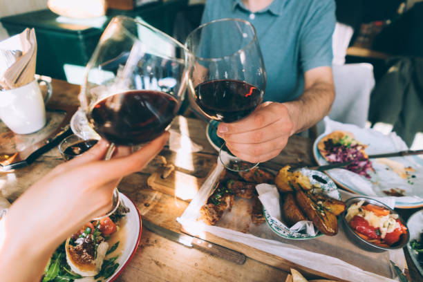 istock Close up of toasting with wine 1127869949