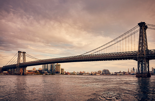 Williamsburg Bridge at sunset, color toned picture, New York City.