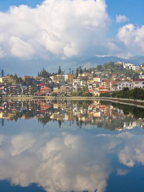 istock Sapa village reflected in a lake 1127871667