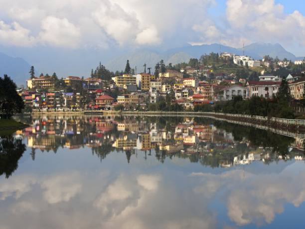 istock Sapa village reflected in a lake 1127871676