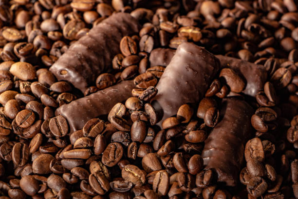Chocolate pieces and coffee beans close up