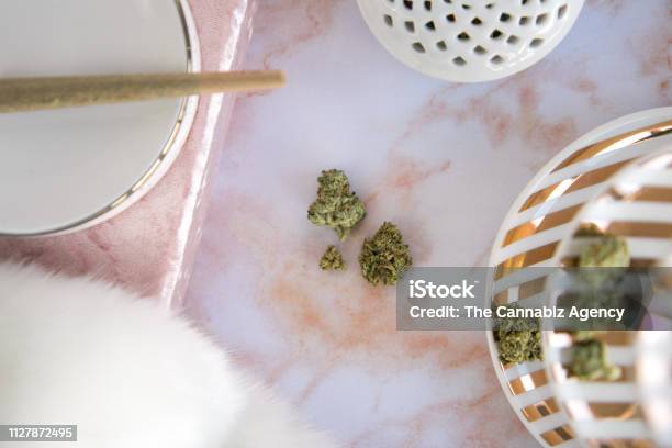 Marijuana Joint On Tray Buds On Pink Marble Vanity Luxury Cannabis Stock Photo - Download Image Now