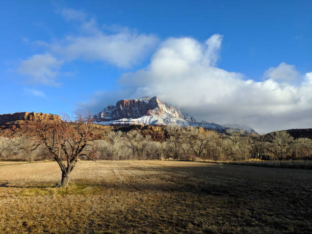 istock Dramatic cloud cap over Mt Kinesava in Zion National Park Utah 1127875826