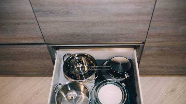 istock metal dishes in the closet in the kitchen. 1127878472