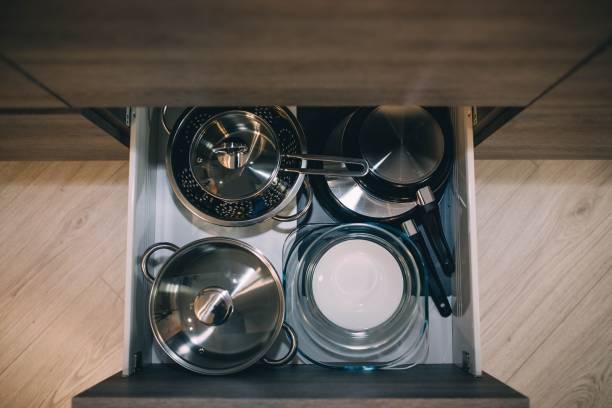 istock metal dishes in the closet in the kitchen. 1127878481