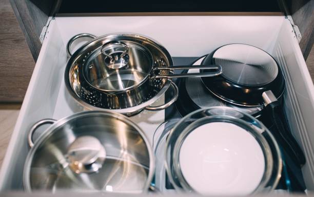 istock metal dishes in the closet in the kitchen. 1127878489