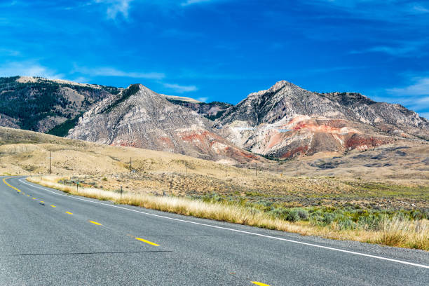 Highway and Bighorn Mountains Highway leading up through the Bighorn Mountain Range and to Sheridan, Wyoming wyoming stock pictures, royalty-free photos & images