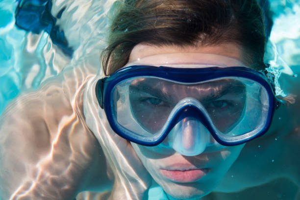 istock Man under water. Vacation and holidays. 1127883959