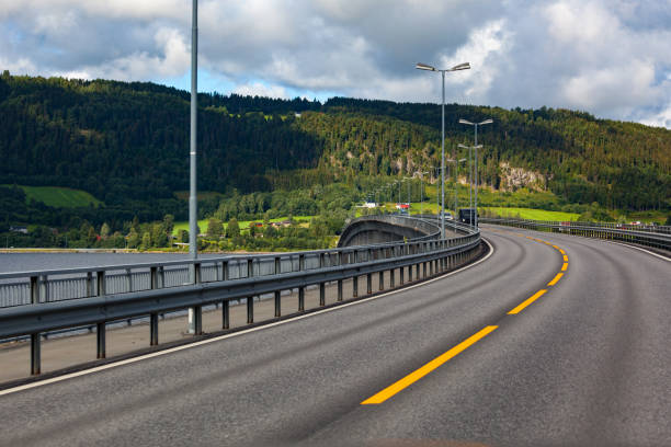 istock Highway  near the mountains in Norway. 1127885579