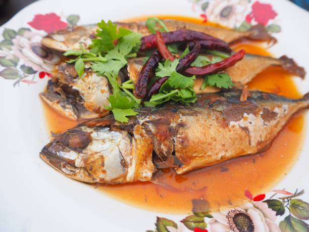 istock Boiled mackerel fish in the sweet sauce on dish in Thai restaurant 1127885607