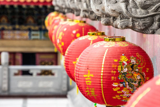 istock Beautiful traditional decoration of red  lanterns background. 1127886373