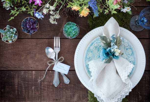 istock Mother's Day Dining Place Setting on Old Wood Background 1127887163