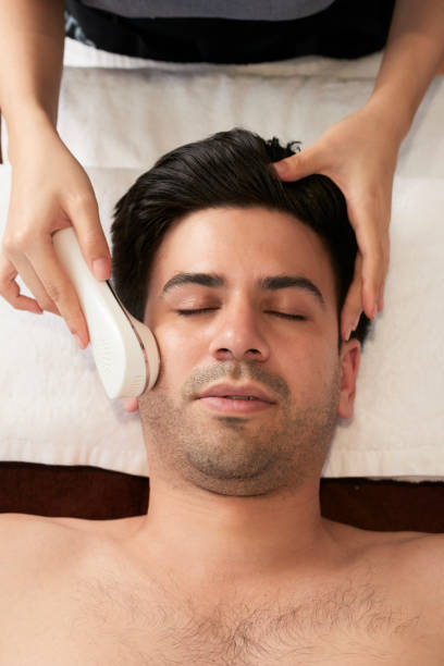 istock Man getting facial cleaning 1127888179
