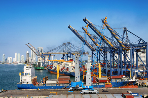 January 27, 2019, Cartagena, Columbia. Port with cargo ships, cranes and containers at the pier of the Port of Cartagena, Colombia