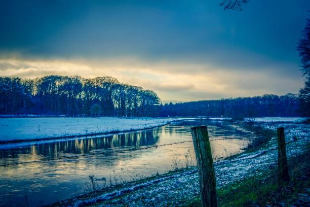 Picture shows an wonderful river in the evening at winter.