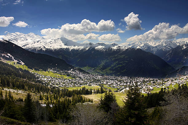 A lush green valley amid the mountains of Switzerland stock photo