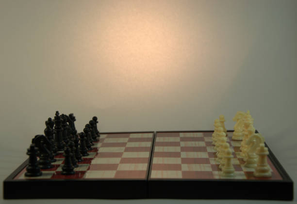 istock A chess board, the figures are arranged, a clever game for two. 1127898989