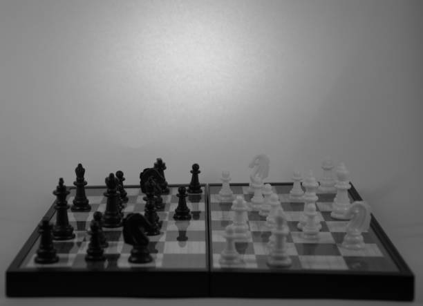 istock A chess board, the figures are arranged, a clever game for two. 1127898991