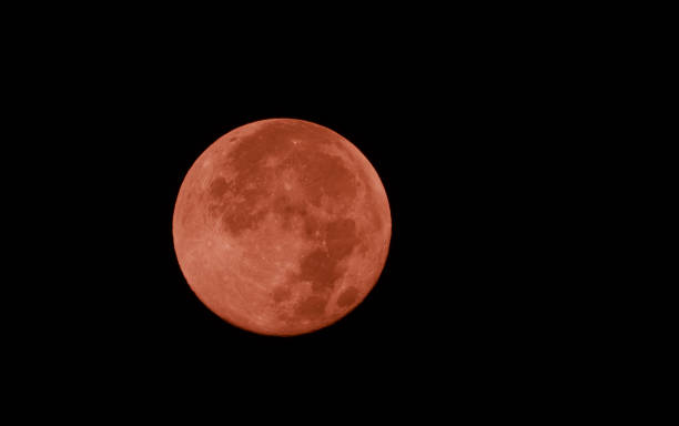 istock Super full moon in the dark night 1127899969